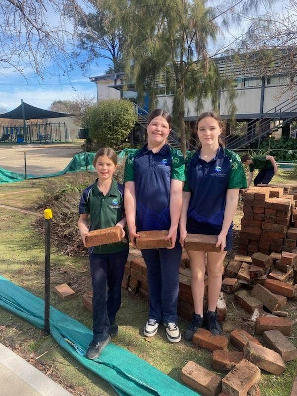 May be an image of 4 people and text